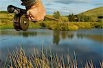 UK,Wales,Conwy. Trout fishing at a hill lake in North Wales