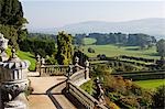 Wales; Powys; Welshpool. View over the Aviary Terrace with its Italianate sculptures of shepherds and shepherdesses and ornate ballustrading at the spectacular garden at Powis Castle