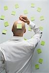 Businessman with Sticky Notes