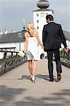 Back View of Bride and Groom Walking to Church, Gmunden, Oberoesterreich, Austria