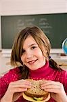 Girl Eating Lunch in School