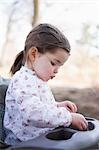 Little Girl Playing Outdoors