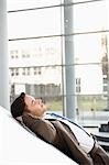 Businessman relaxing in office