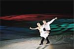 Figure Skaters with Arms Outstretched