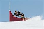 Snowboarder at Giant Slalom Race