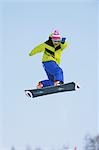 Snowboarder  Jumping  in Mid-air
