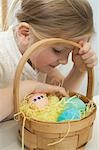 Little Girl With Basket of Easter Eggs