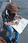 Woman Looking at Map, Mannheim, Baden-Wurttemberg, Germany