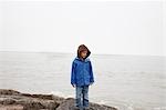 Portrait of Boy Standing on Beach, Seawall Beach, Galveston, Texas, USA