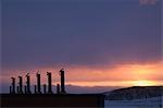 Cheminées au coucher du soleil, McMurdo Station, île de Ross, Antarctique