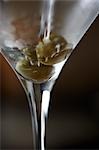 Vodka being Poured into Martini Glass