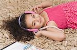 Close-up of a girl listening to headphones