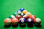 Pool balls arranged on a pool table