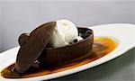 Chocolate dessert served with ice cream