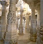 Detail of a few of the 1444 pillars all hand carved and different, inside the Jain Temple, Ranakpur, Rajasthan state, India, Asia