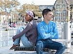 Couple Sitting Outdoors