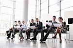 Group of business people with chairs
