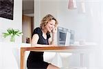 Woman working in home office