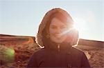 Woman smiling in field