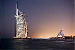 The iconic symbol of Dubai, the Burj Al Arab, the world's first seven star hotel (classified as five star deluxe), built on an artificial island offshore from the Jumeirah Beach Hotel, Dubai, United Arab Emirates, Middle East