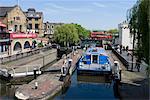 Boat going through Camden Lock, London, England, United Kingdom, Europe