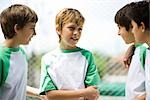 Boys chatting outdoors