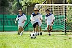 Children playing soccer