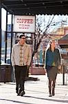 Couple Walking on Sidewalk, Truckee, near Lake Tahoe, California, USA