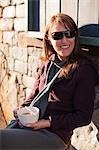 Woman Sitting at Cafe, Truckee, near Lake Tahoe, California, USA