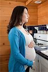 Pregnant woman in kitchen