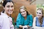 Young woman relaxing with friends