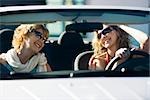 Mother and adult daughter out together in car