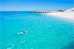 Person snorkelling near tropical beach, Dry Tortugas National Park, Florida, United States of America, North America