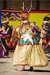 Dancers in costume at Thangbi Mani Tsechu (festival), Jakar, Bumthang, Chokor Valley, Bhutan, Asia