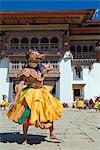 Dancers in costume at Tsechu (festival), Gangtey Gompa (Monastery), Phobjikha Valley, Bhutan, Asia