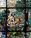 Glasmalerei von Adam und Eva im Garten Eden, Wien, Österreich, Europa
