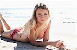 Woman Lying on Beach, Zuma Beach, Malibu, California, USA