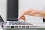 Close-up of Businesswoman Using Laptop Computer