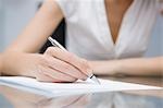 Close-up of Businesswoman Writing