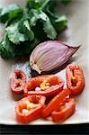 Coriander, a garlic clove and sliced chilli