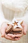 Hands holding Christmas biscuits