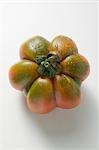 Tomato with drops of water (overhead view)