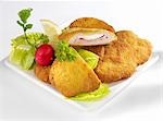 Chicken Cordon Bleu with salad garnish