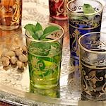 Peppermint tea in Middle Eastern glasses, pistachios