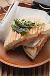 Toasted tomato and halloumi sandwiches with herbs