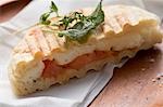 Toasted tomato and halloumi sandwich with herbs