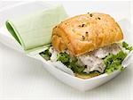 Chicken salad sandwich in polystyrene container