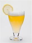 Glass of shandy with slice of lemon (UK)