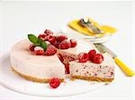 Raspberry cheesecake, a piece cut