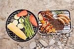 Vegetables on barbecue, grilled food in aluminium dish